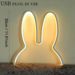 A Cute Iron Art Rabbit USB Lamp with Three Color Options (White Light | Neutral Light | Warm Light) And Dimmable Functionality, Featuring a Minimalist Design That Is Both Functional And Aesthetically Pleasing, Making It an Ideal Gift for Family And